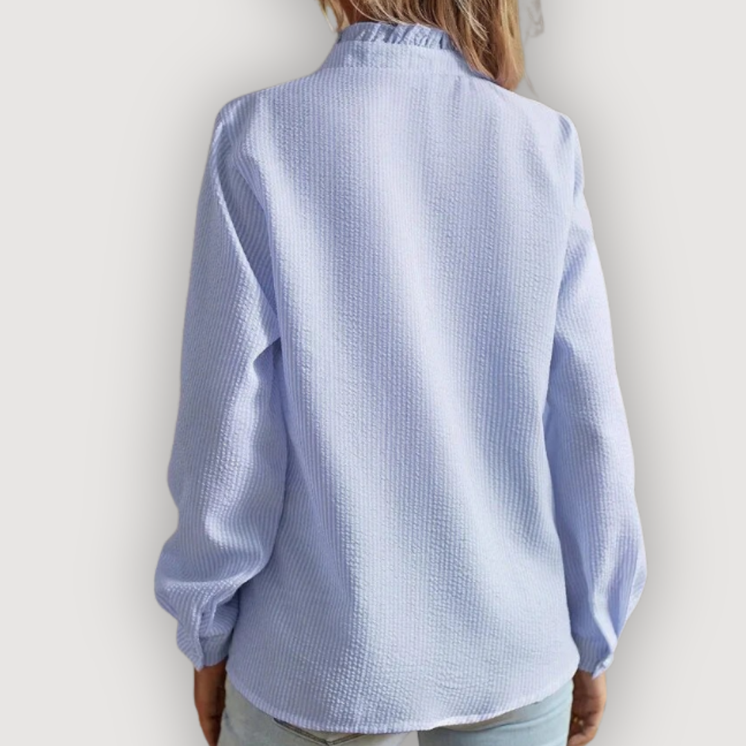 CLARA – RUFFLED BLUE BLOUSE