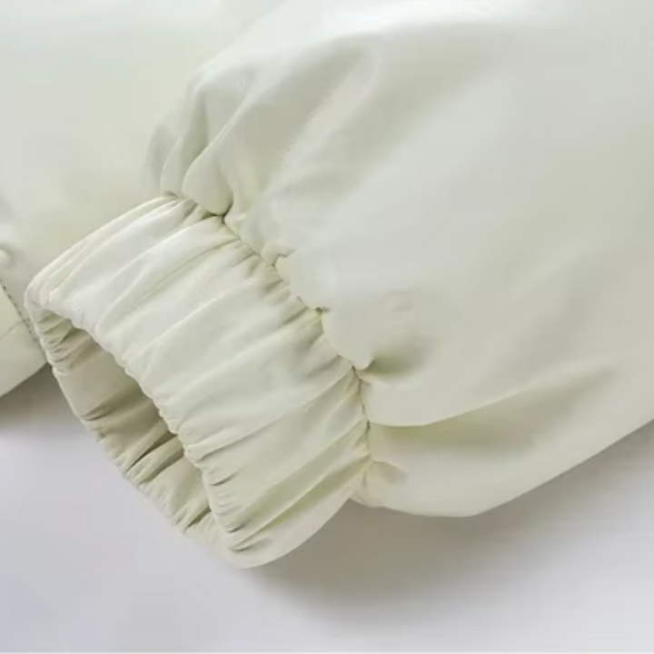 Elegantselt vooderdatud pufferjakk