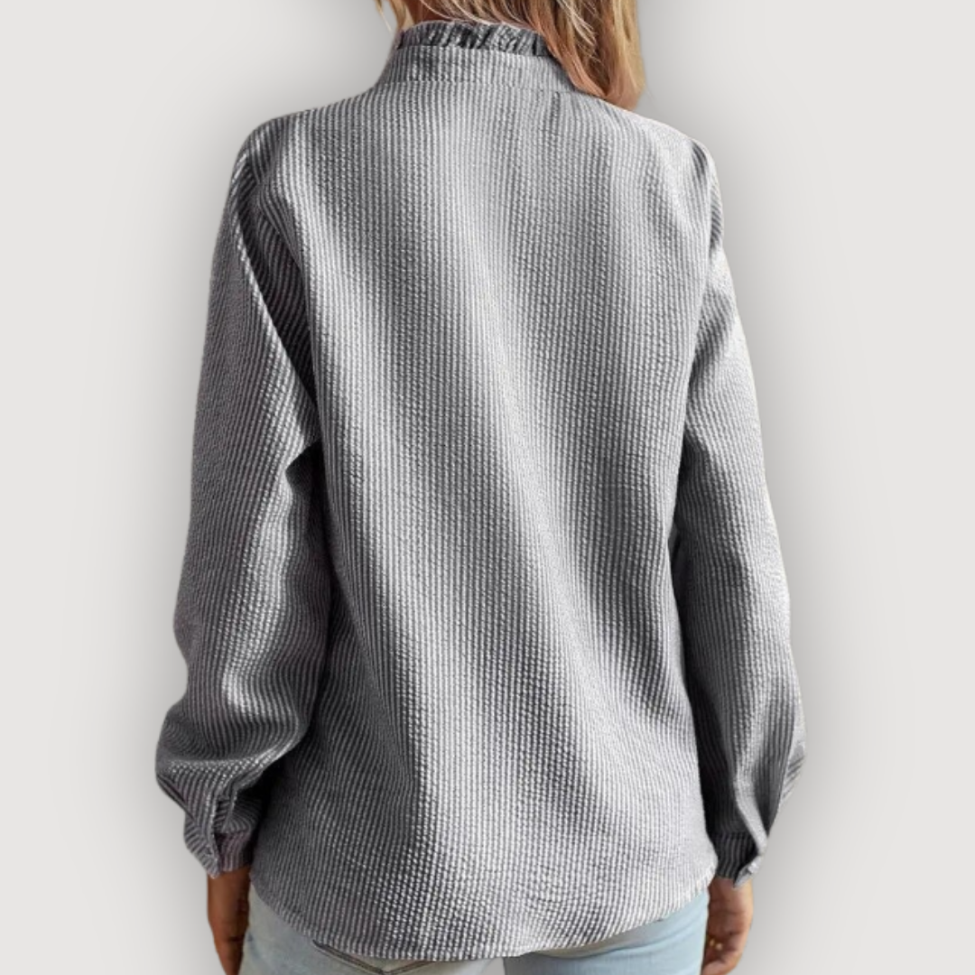 CLARA – RUFFLED BLUE BLOUSE