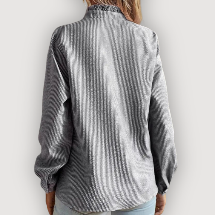 CLARA – RUFFLED BLUE BLOUSE