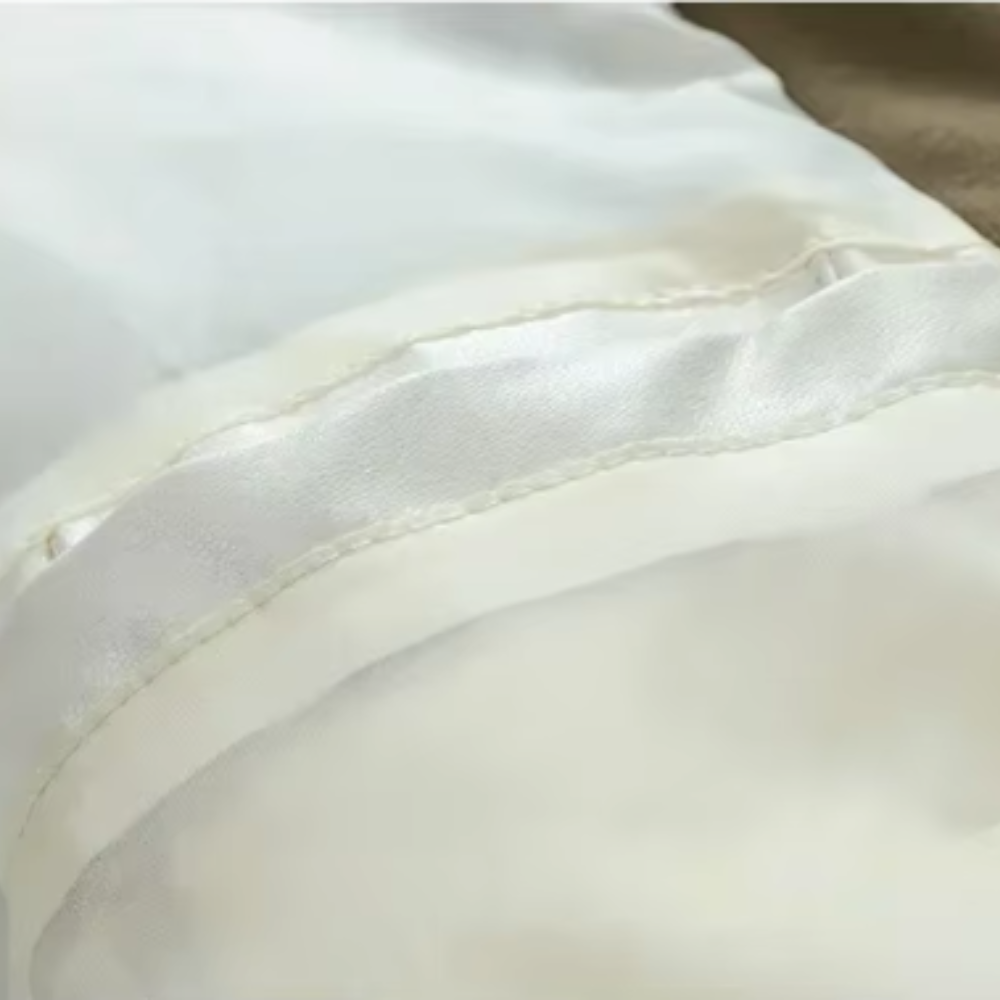 Elegantselt vooderdatud pufferjakk