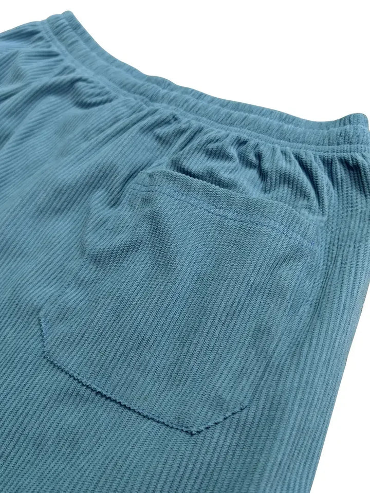 Kaasaskantavad corduroy püksid